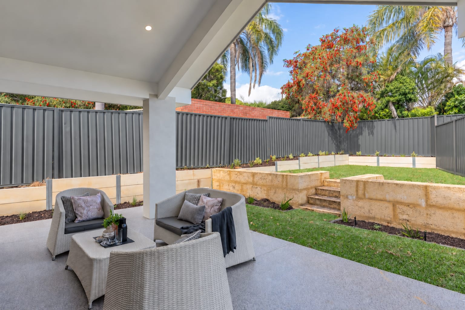 Covered outdoor living area and landscaped garden